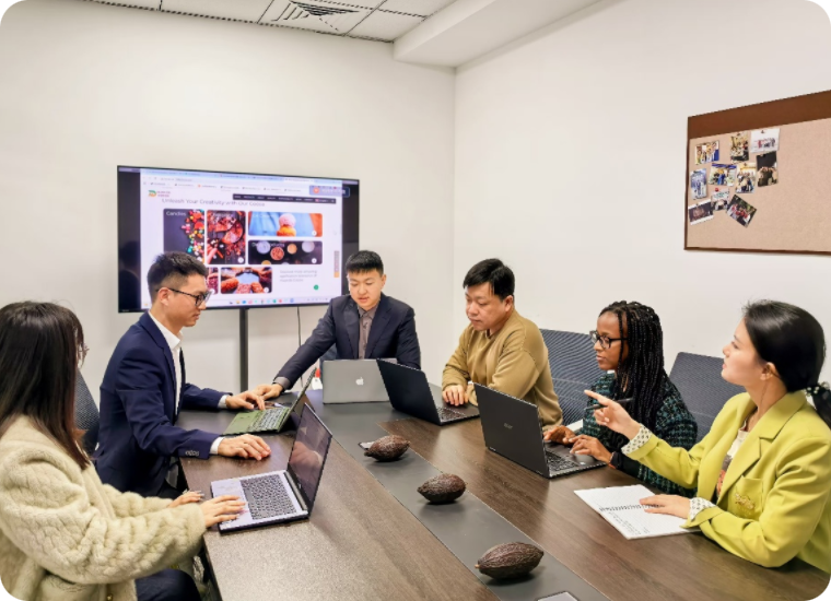 Huanda Cocoa office team collaboration - professional cocoa supplier management and customer service